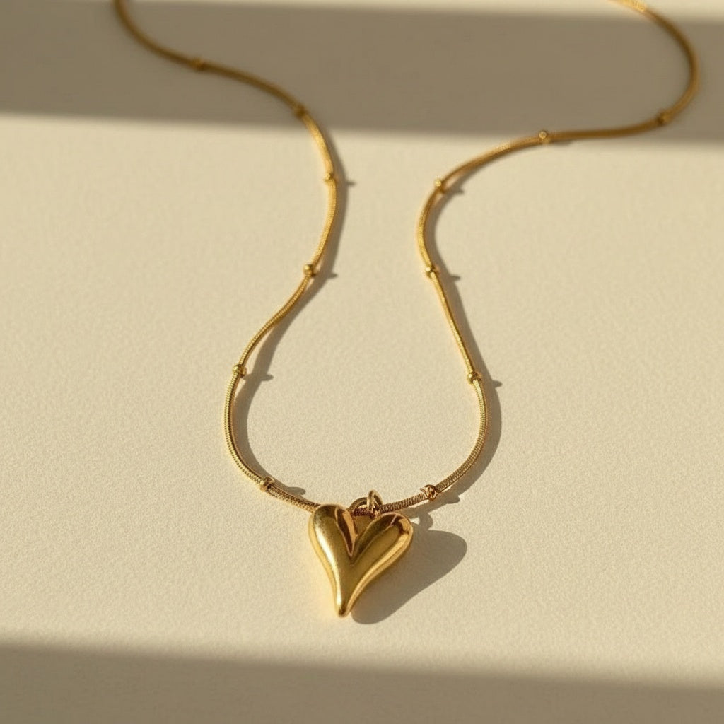 Golden heart pendent with chain