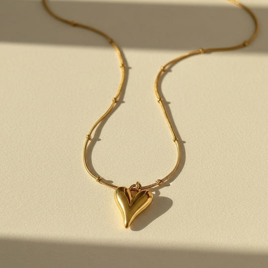 Golden heart pendent with chain