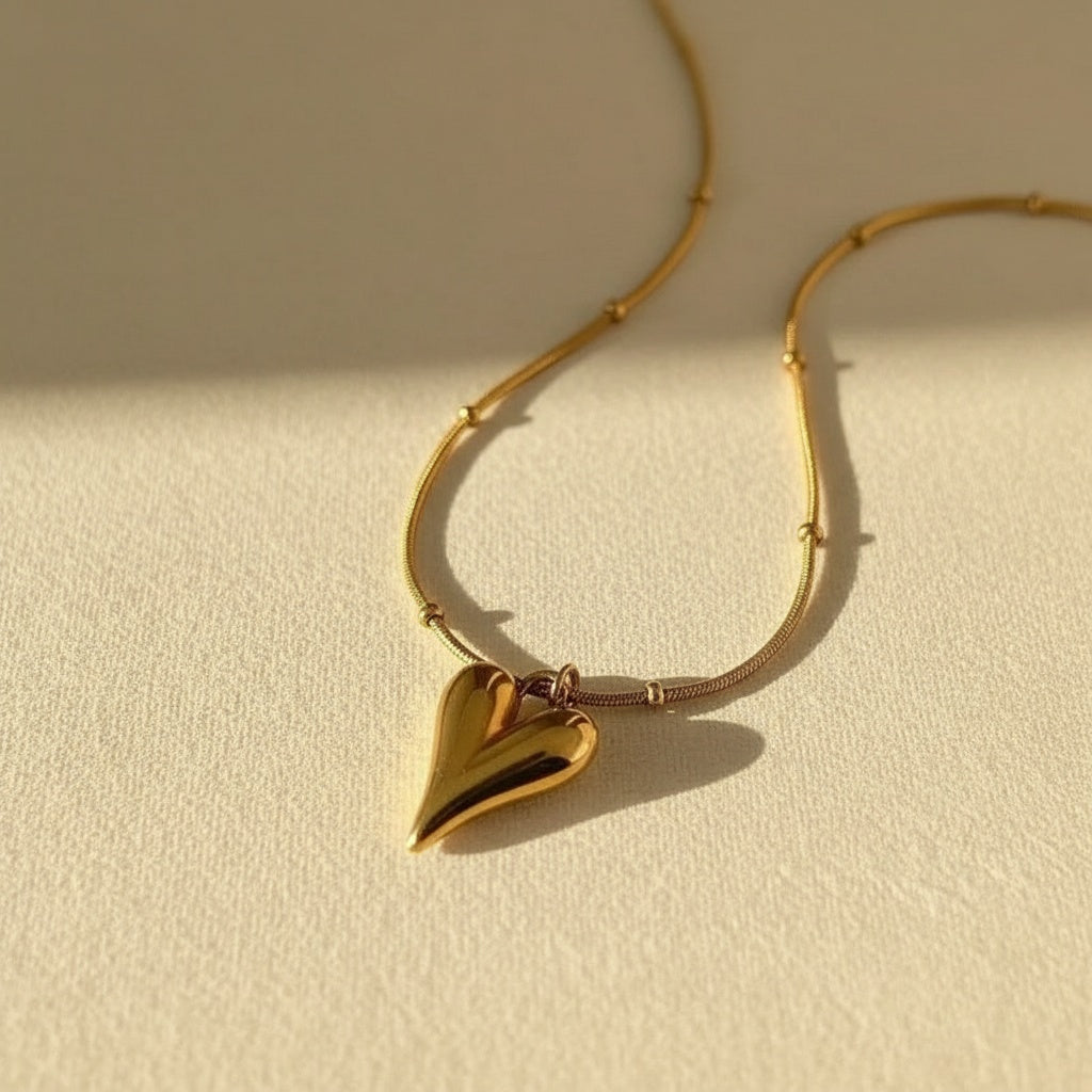 Golden heart pendent with chain