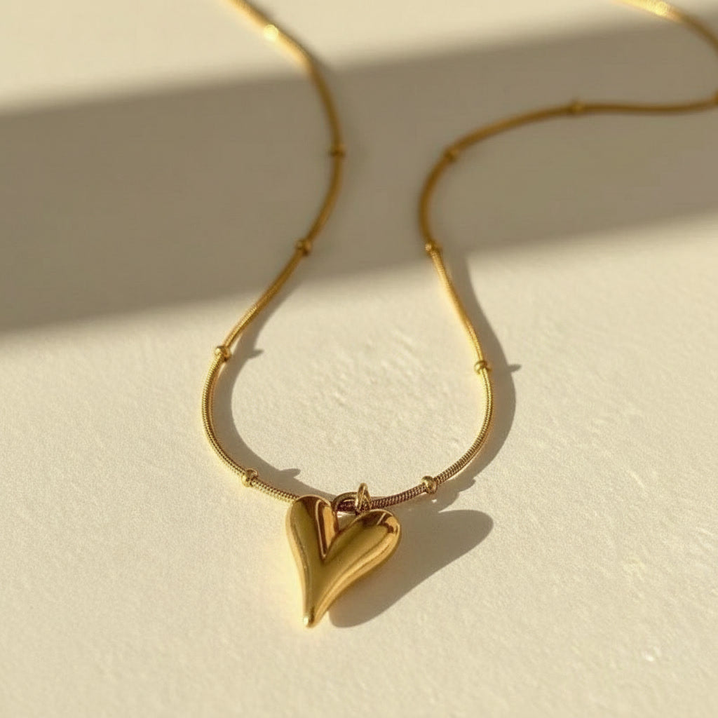 Golden heart pendent with chain